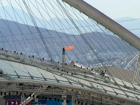 Olympic flame over Athens stadium
